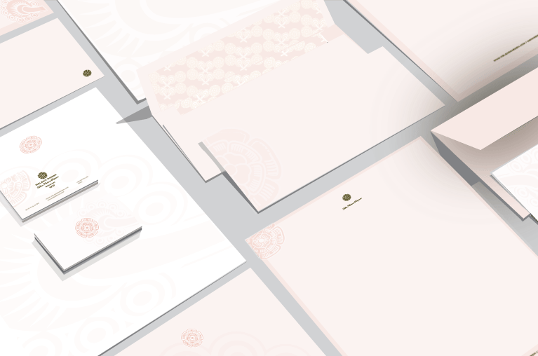 close-up letterhead package with the flower logo
